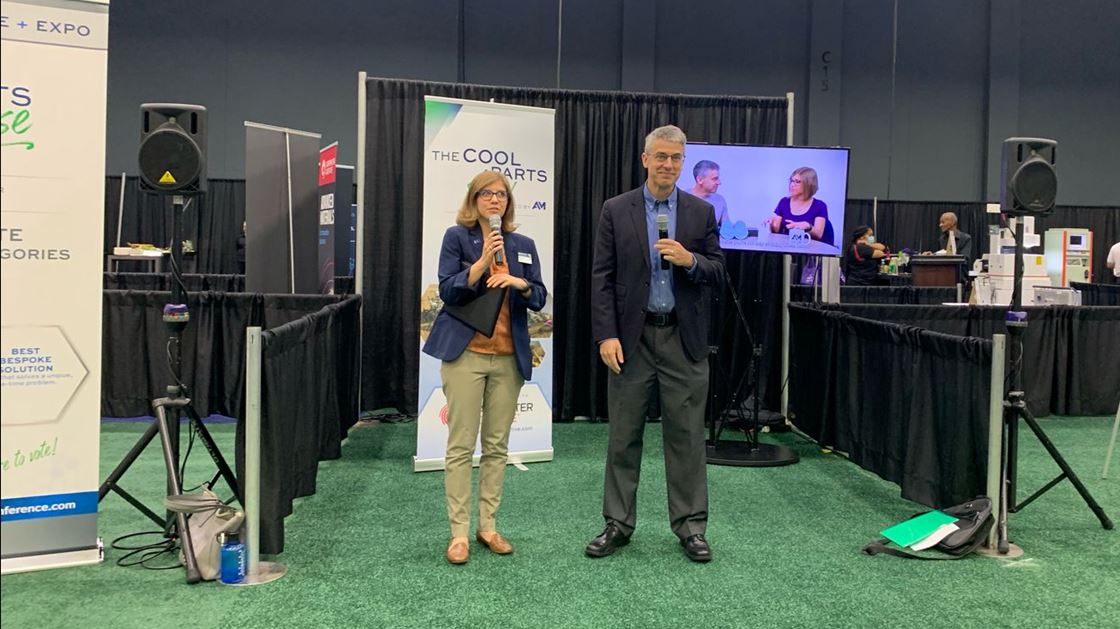 Stephanie Hendrixson and Pete Zelinski announcing the 2021 winners of The Cool Parts Showcase at the Additive Manufacturing Conference