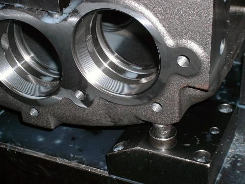 Machining custom grooves in a brake caliper