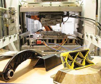 Turnkey manufacturing systems: Part-per-minute thermoplastic composites