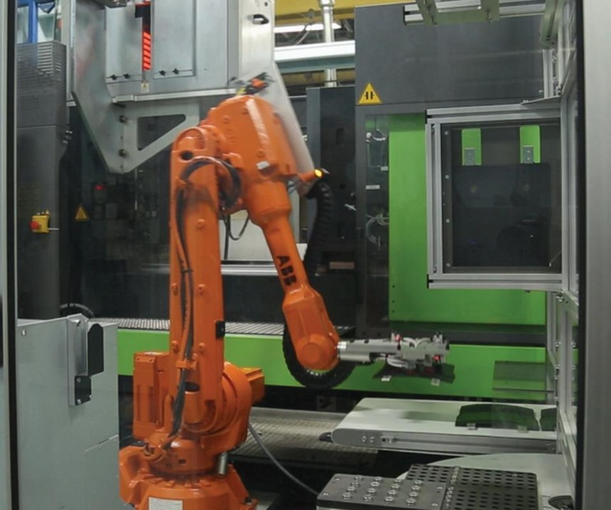 ABB 5-axis robot and an Engel molding machine