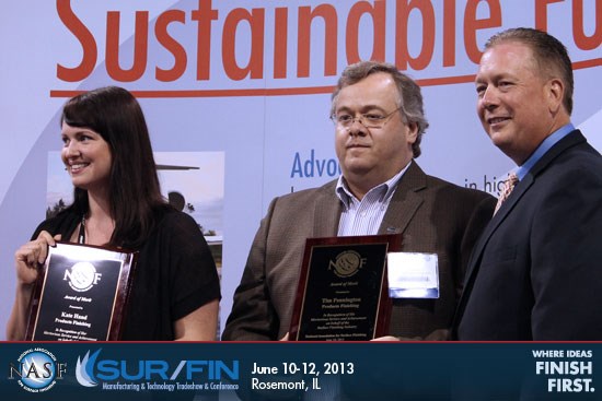 Kate Hand and Tim Pennington receives their NASF Award