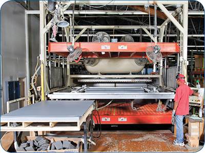 Composites Fabricator Chooses Thermoforming for Bus Part