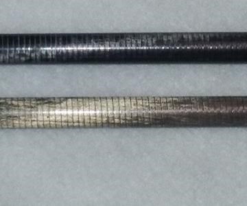 200-nm thick nickel coating vs. a plain carbon fiber composite