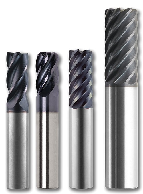 three small end mills and a larger-diameter end mill