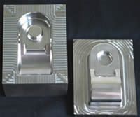 machined from a 4" x 3" x 3" block of H-13 steel