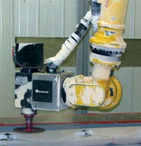 Robot streamlines finishing of composite antenna covers