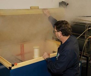 Salt-spray fog disperses when the chamber is opened.  Photo courtesy of H.E. Orr Co.