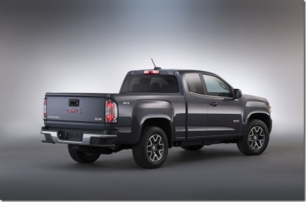 2015 GMC Canyon All Terrain SLE Extended Cab Short Bed Rear Three Quarter in Cyber Grey - in studio