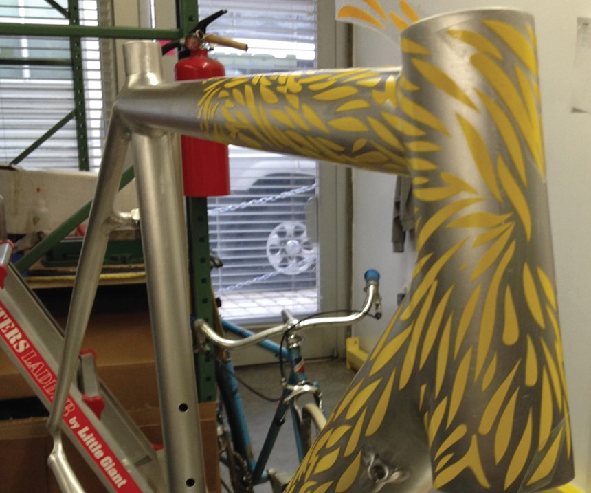 Low uses Mylar-like material for the decals and masking, which often requires several steps in the powder coating process.