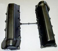 The BMC valve covers are molded in dual-cavity molds, with gating centered along the upper edge as mounted on the engine.