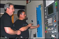 Brad Hart (left) and cell operator Alex Montiel