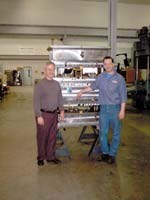 CDM vice president Brian Priestaf (left) and toolmaker Joe Romanski