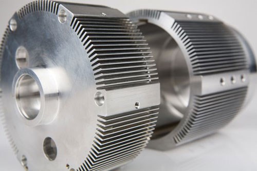 Motor housing with machined fins