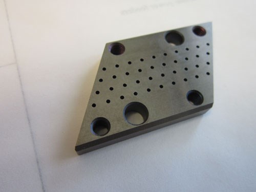 insert for a perforating die