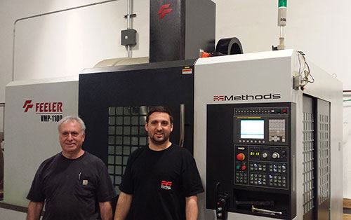 Bruce and Bradd Sarro stand by the Feeler VMP-1100S VMC