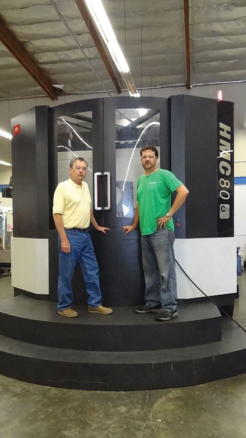 Larry and Rodney de Caussin with the SMTCL HMC80 machining center