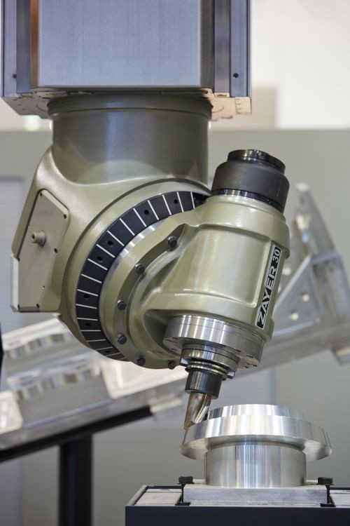 Head Processes Machine Two-Axis Automatic Head Mills Complex Surfaces | Modern Machine Shop