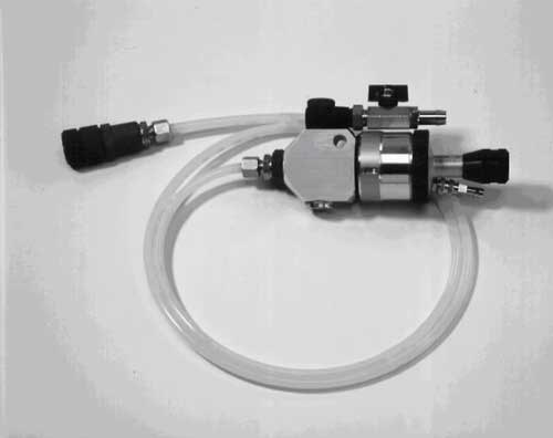 Example of a high pressure spray gun using a remote extension tip. Useful in manual buffing systems, as well as getting into tight areas. 