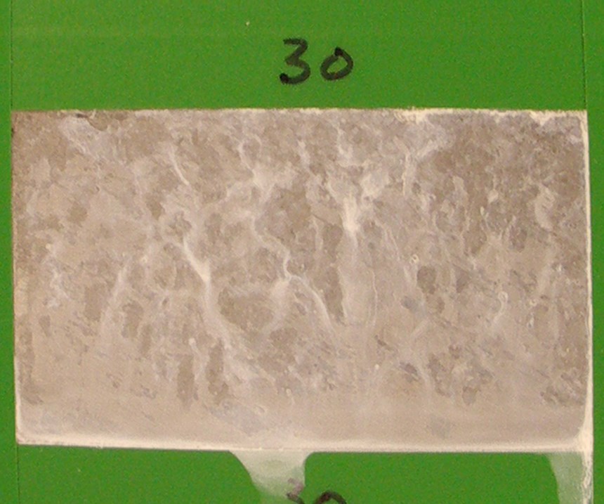 1407 hours: Corrosion test panels of brush plated zinc-nickel LHE with a trivalent conversion coating.