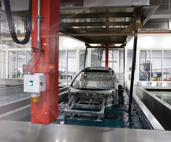 Honda builds ecoat system for Acura NSX Performance Manufacturing Center.