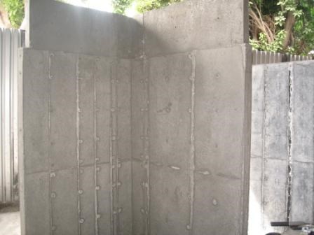 Concrete wall made with molded long-glass thermoplastic forms