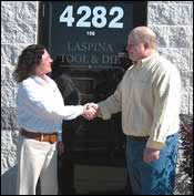 Tim LaSpina, president of LaSpina Tool & Die, and ERP vendor, Billie Henning