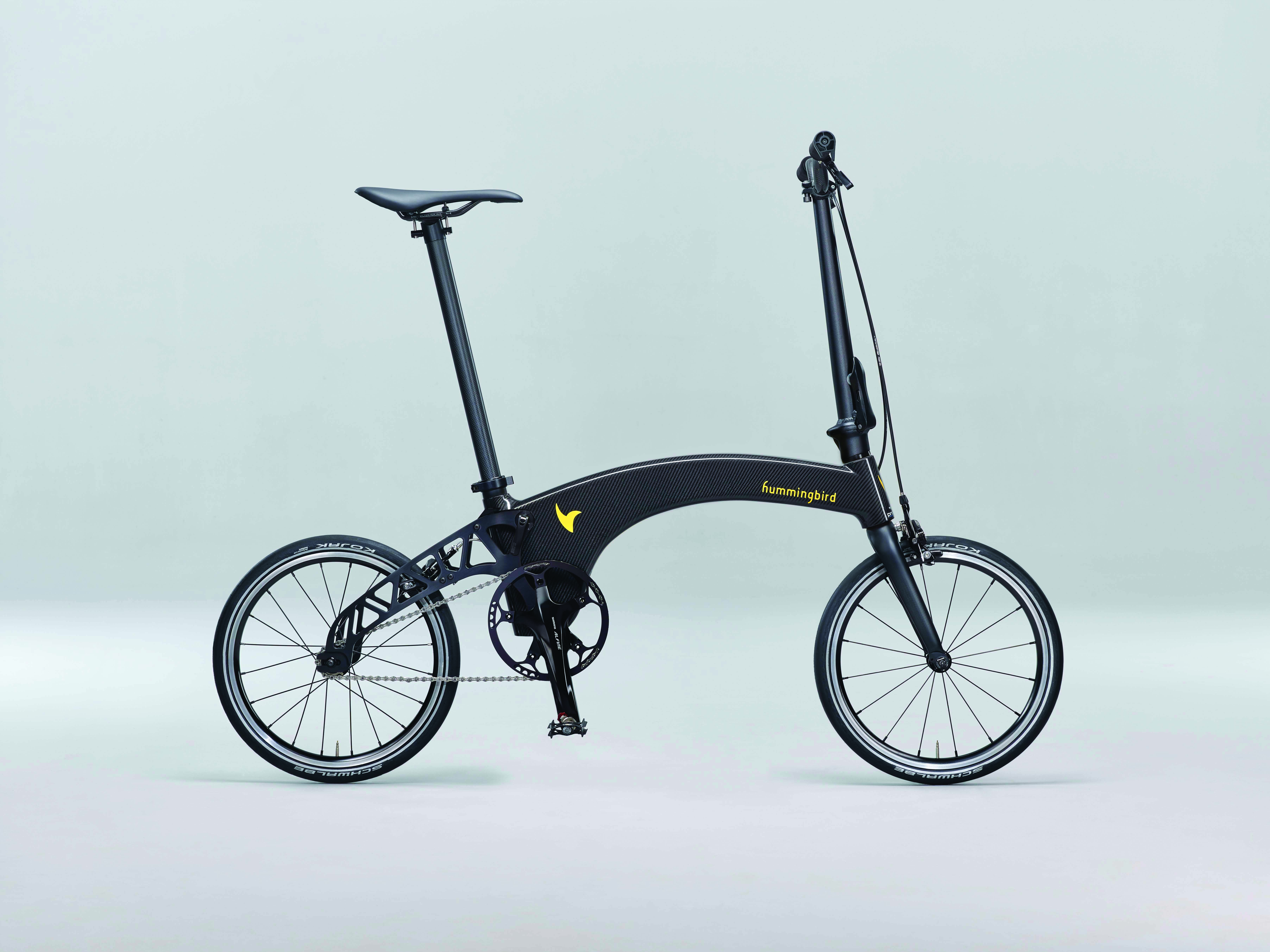 The Hummingbird is a carbon-fiber  intensive, hand-built, folding bike that weighs a mere 6.9 kg. It is being produced by a leading systems engineering firm in the UK that not only has powertrain innovations to its credit, but a long list  of motorsports victories.