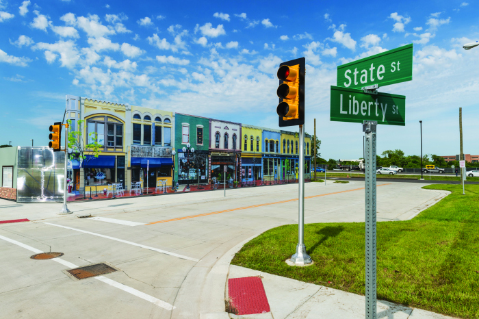 Although the street signs indicate an intersection in downtown Ann Arbor, this one is a few miles away, on the Mcity site, which was developed to help advance the research into and development of automated driving capabilities.