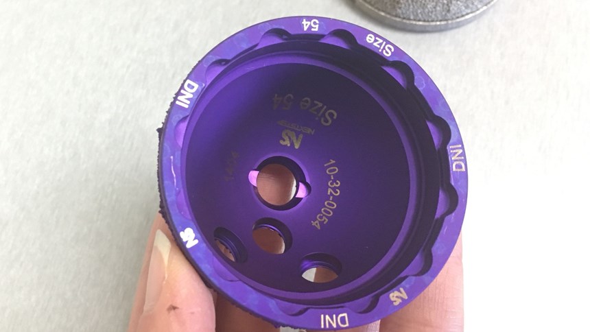 Inside of the hip cup, showing the serial number, size and other laser markings