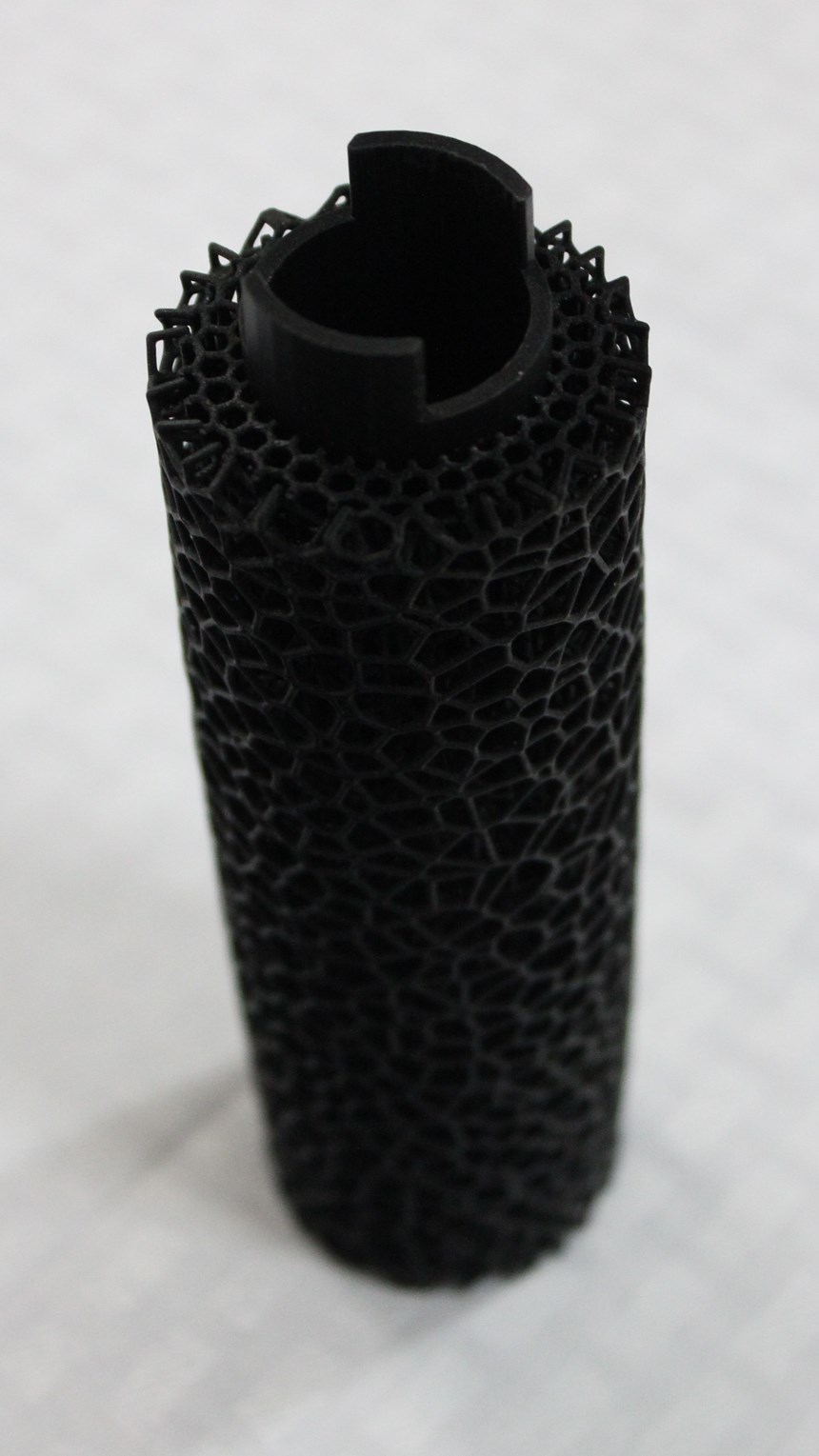 Overmolded 3D printed Carbon part