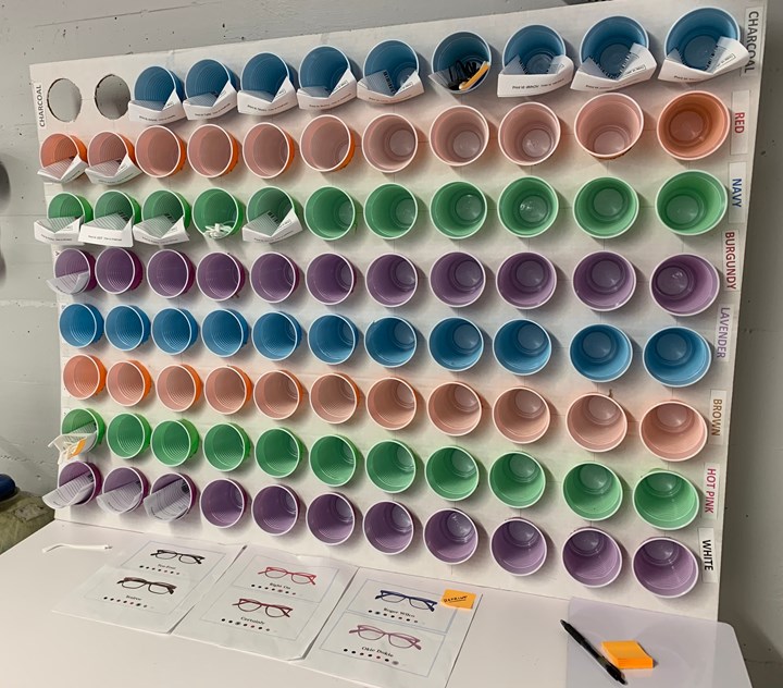 colored cups on a board for sorting glasses