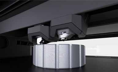 MakerBot extruders printing metal.
