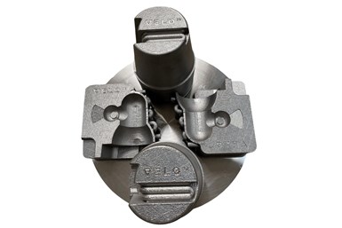 An M300 tool steel print of conformal cooled tooling and high pressure die casting inserts. The print is shown as printed on the build plate. Photo Credit: Velo3D