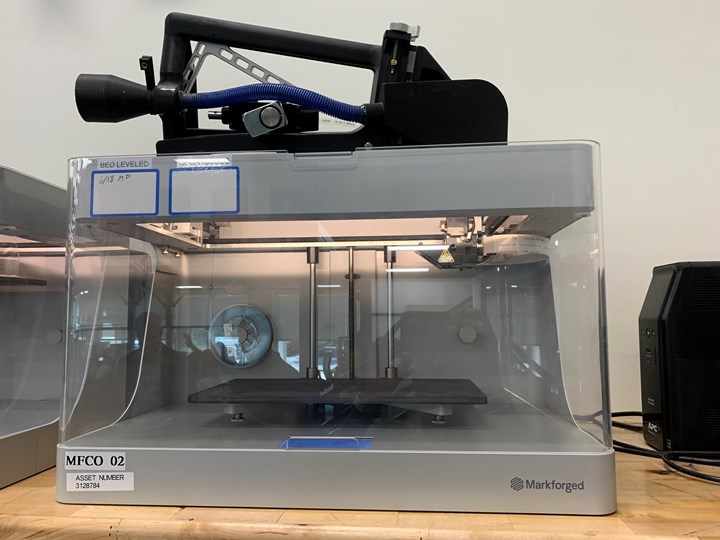 Markforged printer with cut off tool on top 
