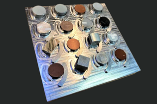 a sample plate with various different metallic materials