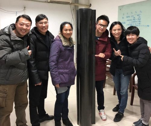Covestro and Suzhou Yichangtai Plastic Co., Ltd. team during molding trial for air conditioner housing using CFRTP composite