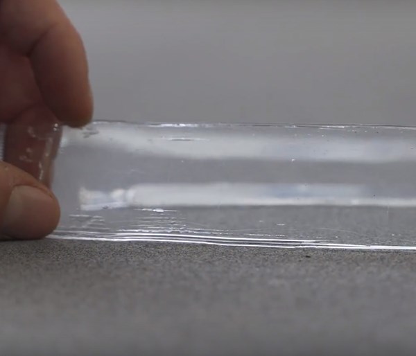 Organoglass transparent fiber-reinforced thermoplastic composite