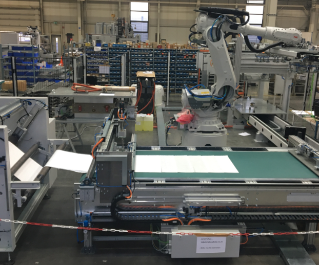 Smc Compounding Machine An SMC machinery provider adds automation | CompositesWorld