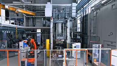 Wickert heated press and T-RTM equipment setup at DLR ZLP.