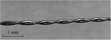 twisted coated wire to form linear dielectric sensor