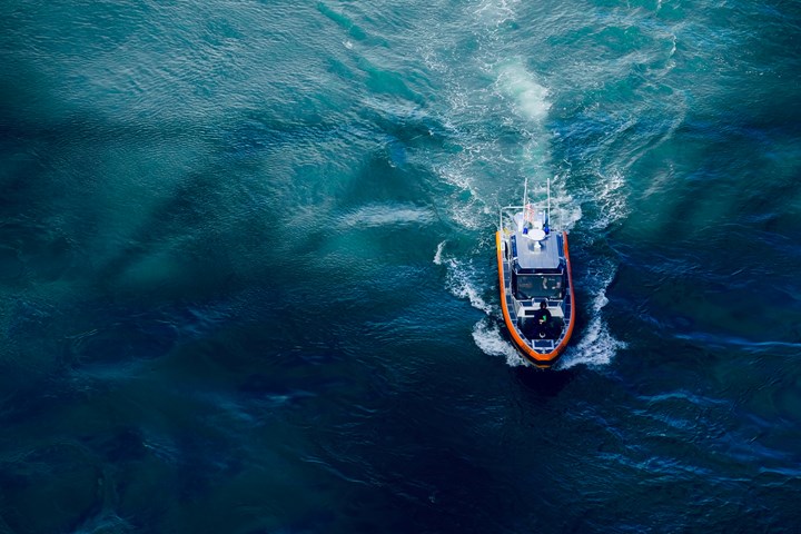 Aerial view of boat on water.