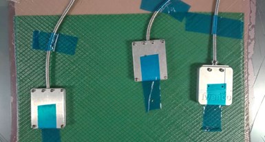 Twenco sensors on top of vacuum bag in resin infusion trial