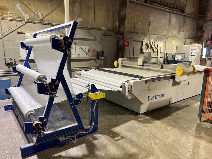 Eastman cutter with feed rolls