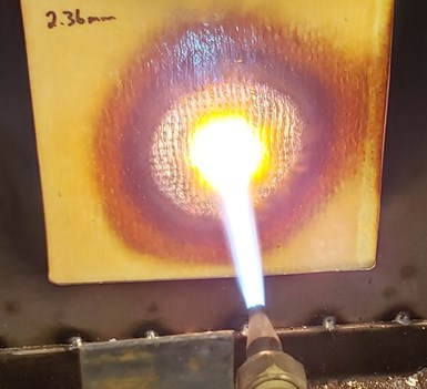 Westlake fiberglass/epoxy composite being subjected to a flame test.