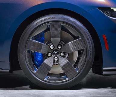 Up-close shot of Mustang Dark Horse carbon fiber wheels.