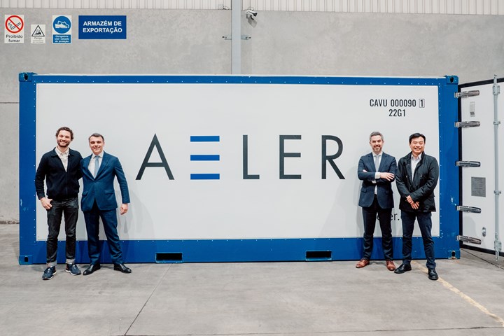 Aeler Technologies and Navex partners in front of shipping container.