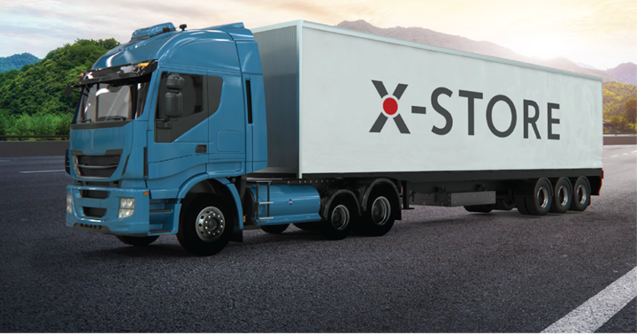 X-Store written on the side of a truck trailer.