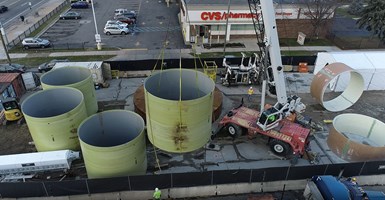 giant pipes being unloaded