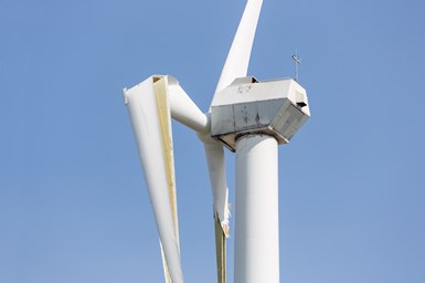 Wind turbine with broken wings after a heavy spring storm in the Netherlands.