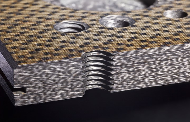 Hufschmied machined threaded fastener hole in CFRP panel